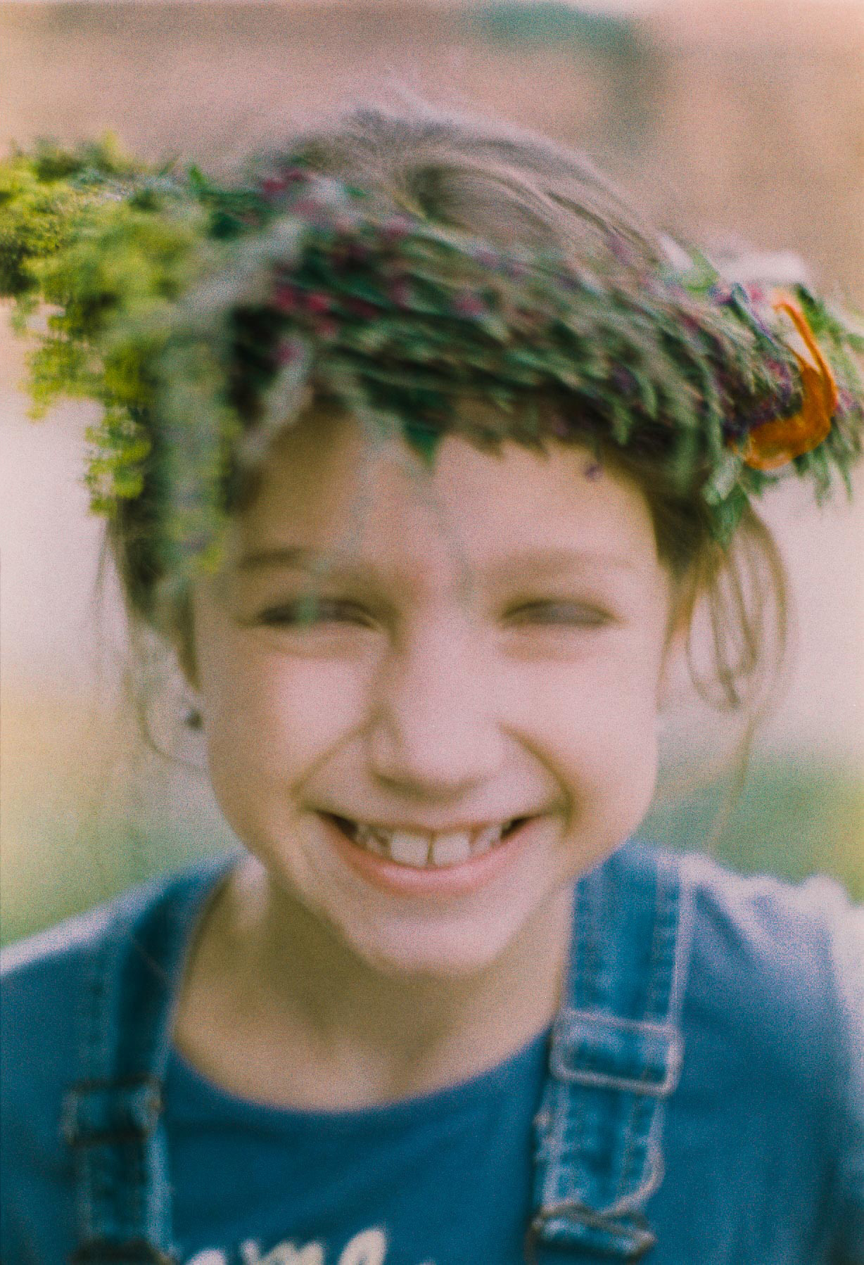 A girl with a wreath of flowers